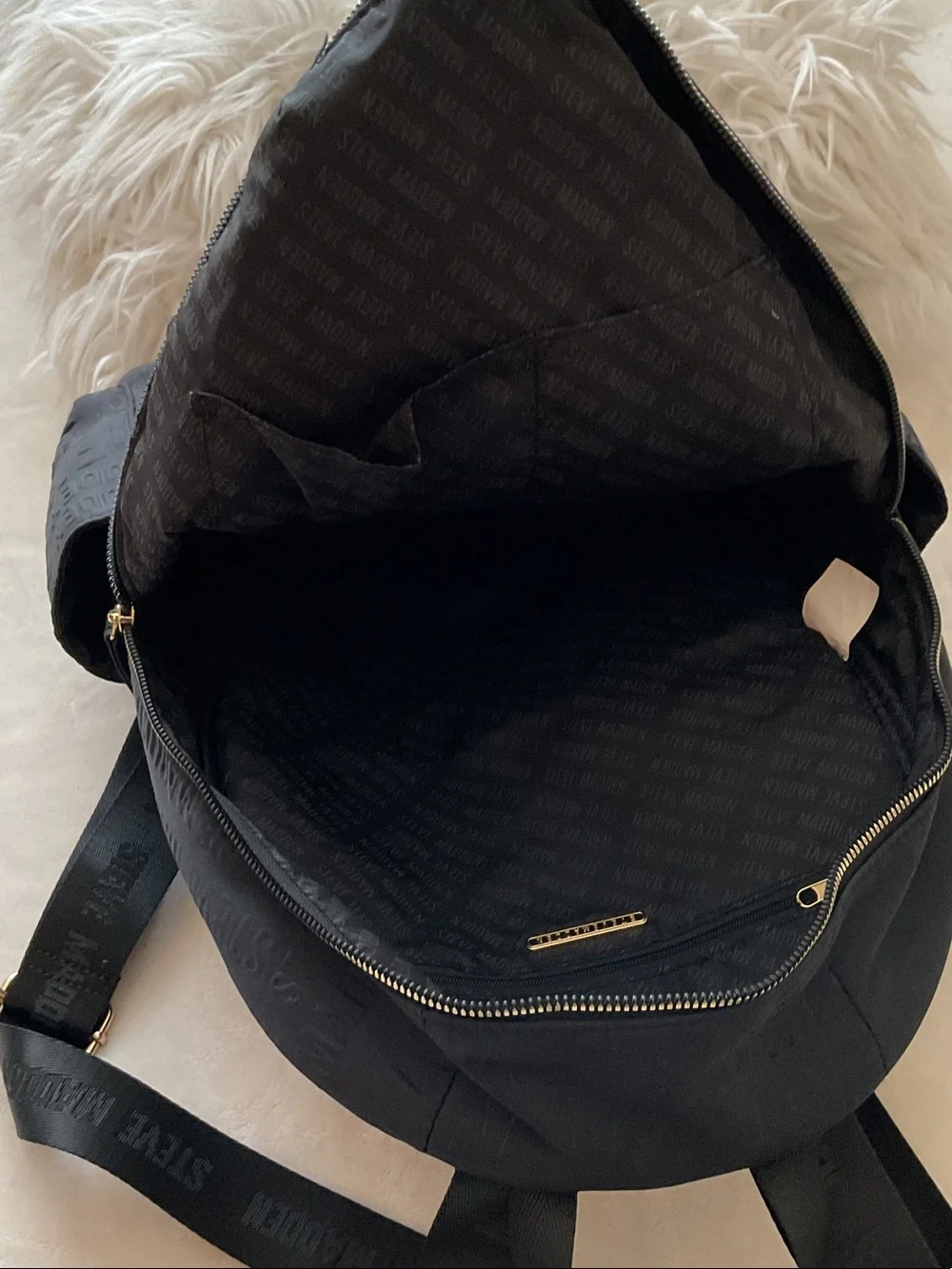 Steve Madden Black Embossed Logo Backpack with Gold Zipper